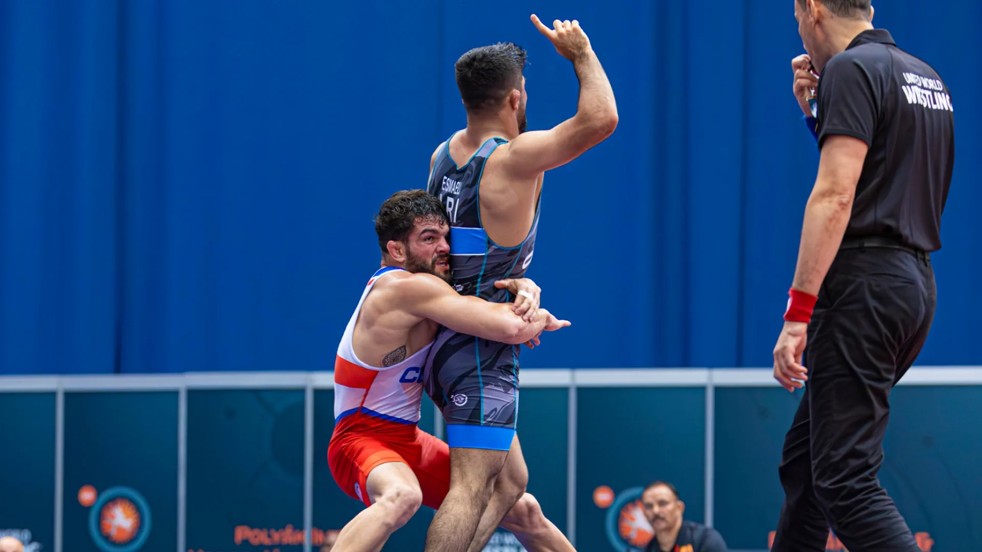 Iranian wrestler defeats reigning Olympic champion, knocks him out of the race for the Olympic gold medal